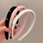 A Luxurious And Stylish Satin Headband with a Silvery Bow, Perfect for High Hairstyles And Face Washing
