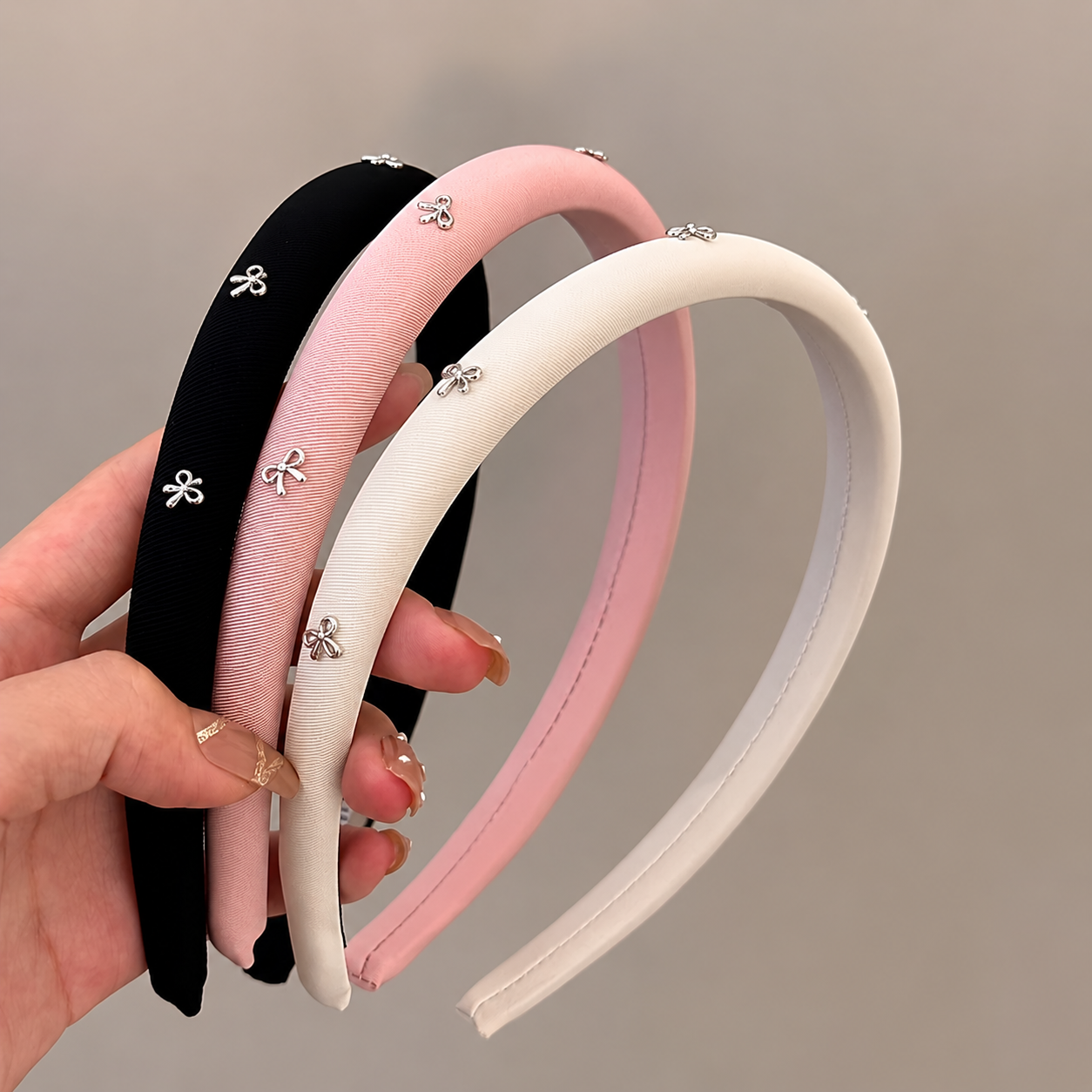 A Luxurious And Stylish Satin Headband with a Silvery Bow, Perfect for High Hairstyles And Face Washing