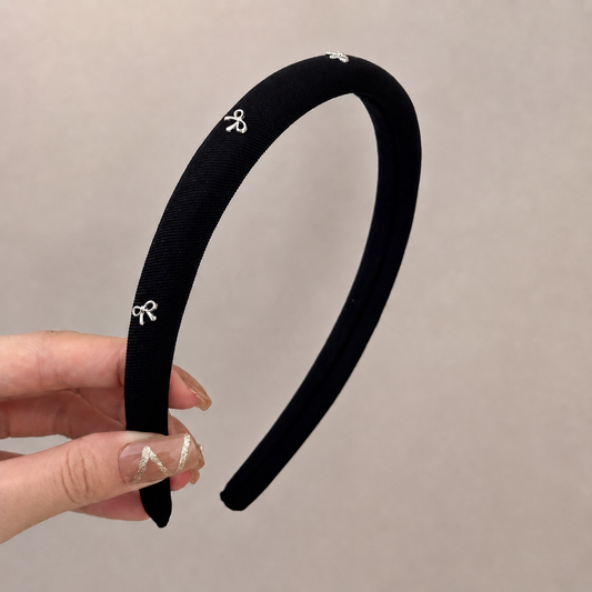 A Luxurious And Stylish Satin Headband with a Silvery Bow, Perfect for High Hairstyles And Face Washing