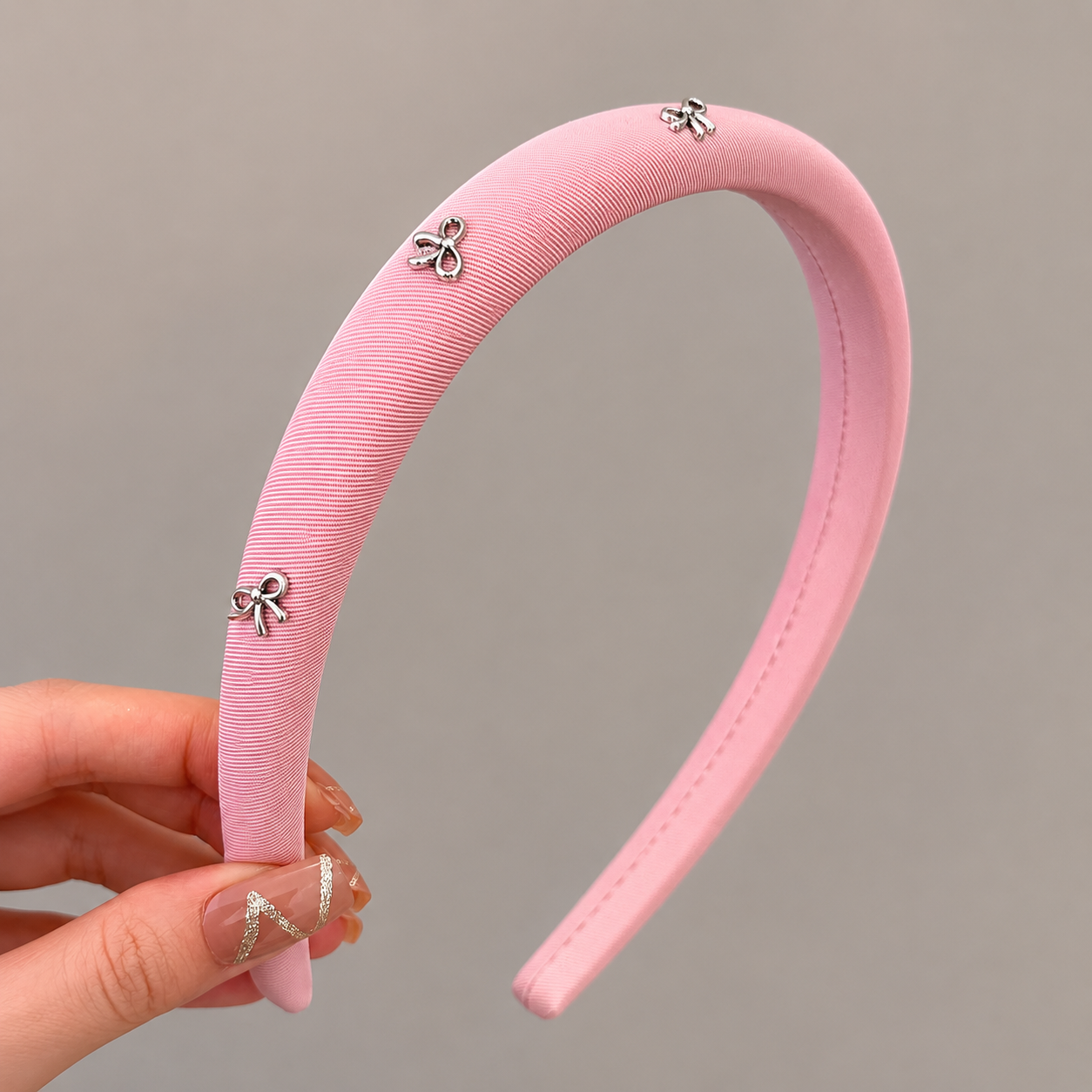 A Luxurious And Stylish Satin Headband with a Silvery Bow, Perfect for High Hairstyles And Face Washing